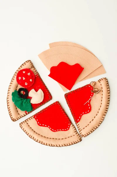 Handmade pizza. DIY felt children toy.