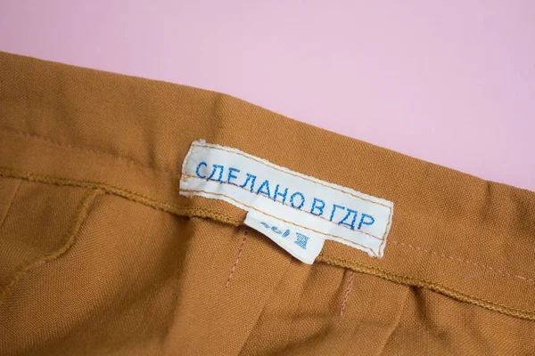 the inscription in russian Made in the DDR on the Textile label on vintage clothing