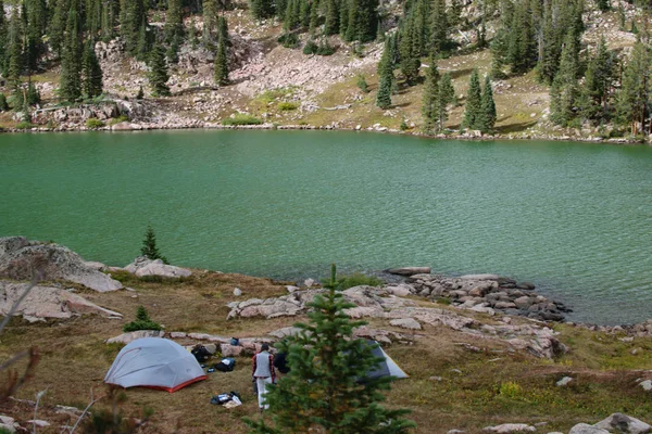 Majestic Lake With Camping Tent In the Distance