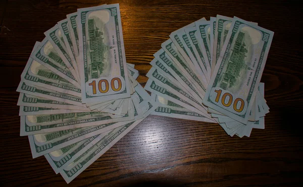 Fanned 100 Dollar Bills Woden Table — Stock Photo, Image