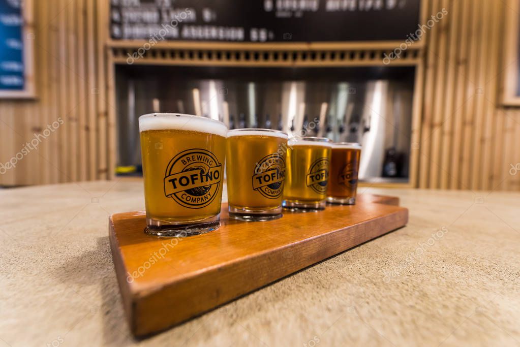 Tofino, British Columbia, Canada, September 20, 2018 - A tasting flight of different beers from local craft brewery, Tofino brewing Company, on Vancouver Island in the touristy surf town of Tofino