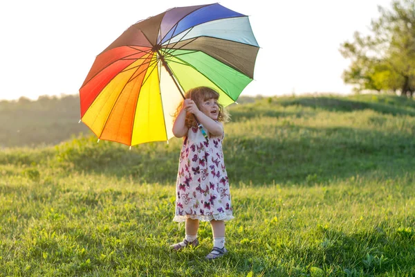 Beautiful Girl Plays Nature Colorful Umbrella Rainbow Umbrella Hands Child — Stock Photo, Image