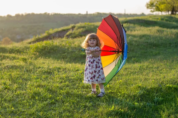 Beautiful Girl Plays Nature Colorful Umbrella Rainbow Umbrella Hands Child — Stock Photo, Image