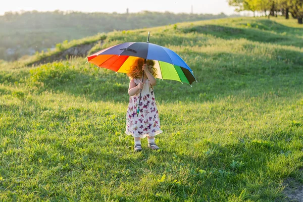 Beautiful Girl Plays Nature Colorful Umbrella Rainbow Umbrella Hands Child — Stock Photo, Image