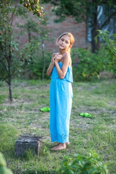 Beautiful Long Haired Girl Picks Pears Garden Child Holding Pear — Stock Photo, Image