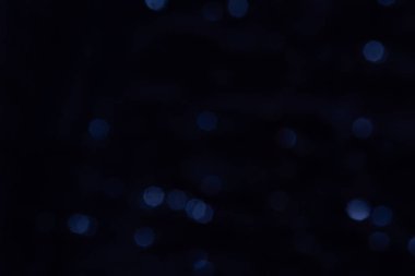 Bulanık koyu kırmızı arka plan güzel bokeh etkisi ile.