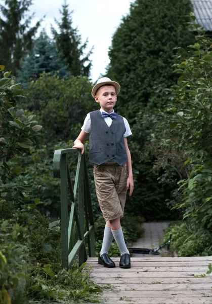 Retro portrait of young man in summer garden — Stock Photo, Image