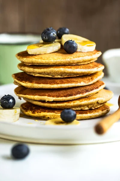 Banana and Oat Pancakes with fresh Blueberry and Banana — Stock Photo, Image