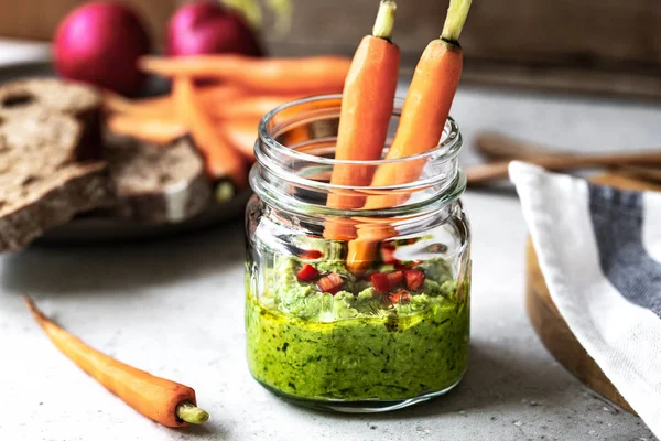 Spinach Hummus in a glass jar — Stock Photo, Image