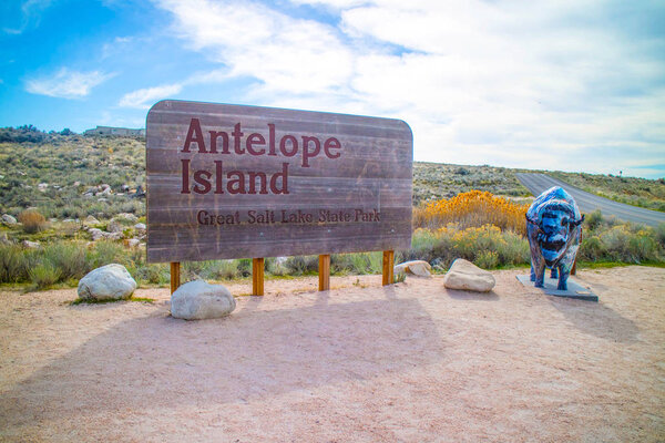 An entrance road going to Antelope Island State Park, Utah