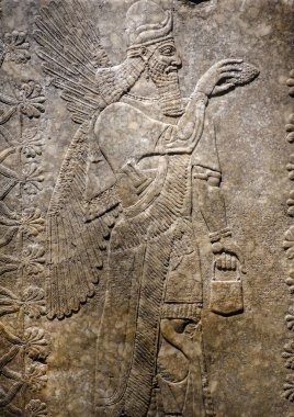 Kaymaktaşı 883-859 M.ö circa yapılan kanatlı cin paneli bir Neo-Asur royal palace of King Ashur-nasir-pal II Nimrud, Irak yakınındaki dekore edilmiştir..