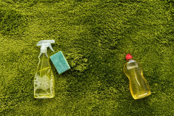 Close View Bottles Detergent Rag Green Carpet Copy Space — Stock Photo, Image