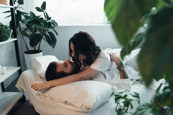 Beautiful Young Romantic Couple Embracing While Lying Bed Home — Stock Photo, Image