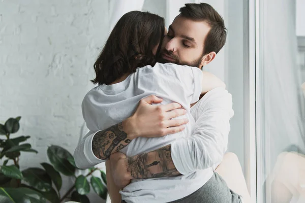 Beautiful Young Couple Passionately Hugging Home — Stock Photo, Image