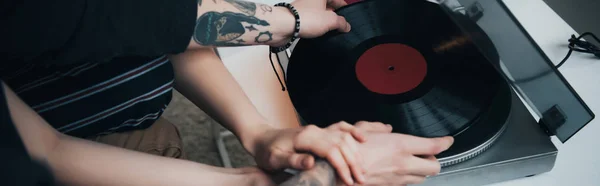 Cropped View Tattooed Couple Putting Vinyl Record Record Player — Stock Photo, Image