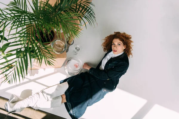 Stylish Redhead Girl Sitting Posing Wooden Boxes Glasses Plants Grey — Stock Photo, Image