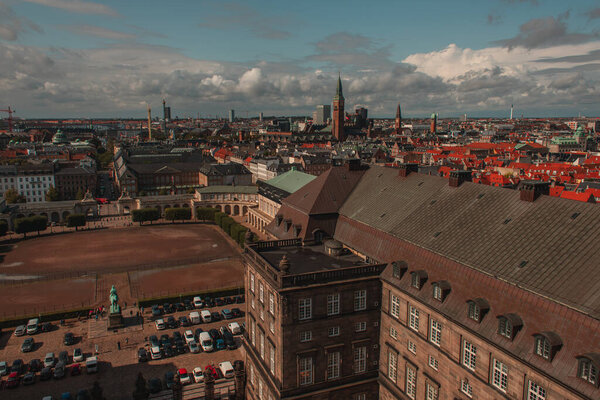 High angle view of facade of Christiansborg Palace with cloudy sky at background, Copenhagen, Denmark 
