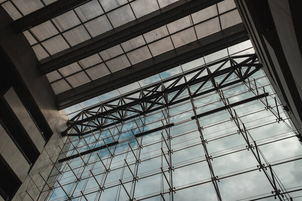 COPENHAGEN, DENMARK - APRIL 30, 2020: Bottom view of glass facade and roof of Black Diamond Royal Library, Copenhagen, Denmark 