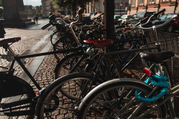 Selective focus of bicycles on walkway on urban street in Copenhagen, Denmark — Stock Image Selective Focus Bicycles Walkway Urban Street Copenhagen Denmark Royalty Free Stock Images