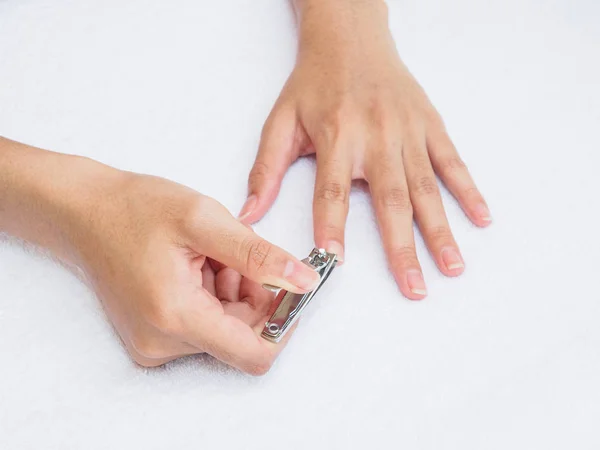 Woman Cutting Nails Using Nail Clipper White Background Health Lifestyle — Stock Photo, Image