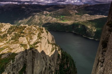A beautiful landscape with a rocky mountains and fjord near Preikestolen in Norway