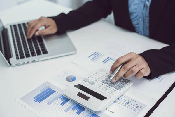 Businesswomen Calculating Finances Analyzing Market Data Graphs Laptops Work Business — Stock Photo, Image