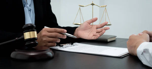 Lawyer or counselor works in the courtroom and negotiates with clients or complainants seeking justice on land encroachment, Law that validity and justice concept.