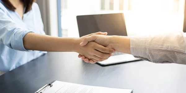 Employer or HR department welcomes new employees, Shaking hands with congratulations or achieving business and income success, Hand shake concept.