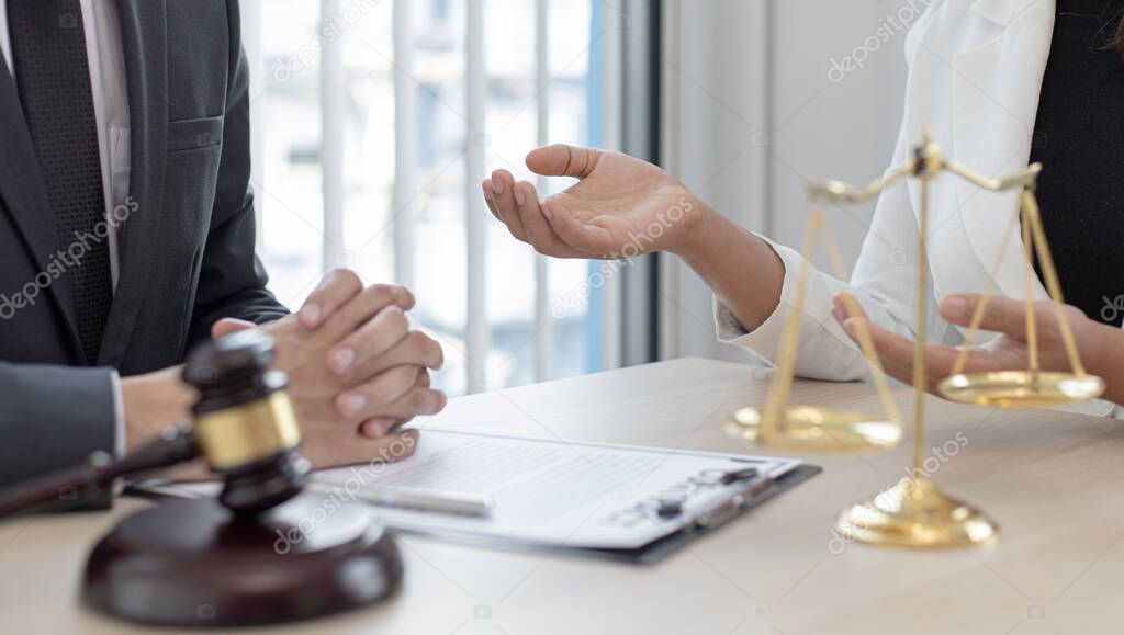 Attorneys or consultants work in the courtroom and negotiate with clients or complainants who want justice in corporate fraud cases, Litigation and justice concept.