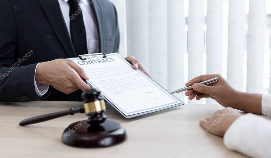Attorneys or consultants who work in the courtroom are currently investigating the company's corruption cases and have their clients sign legal confirmation, Litigation and justice concept.