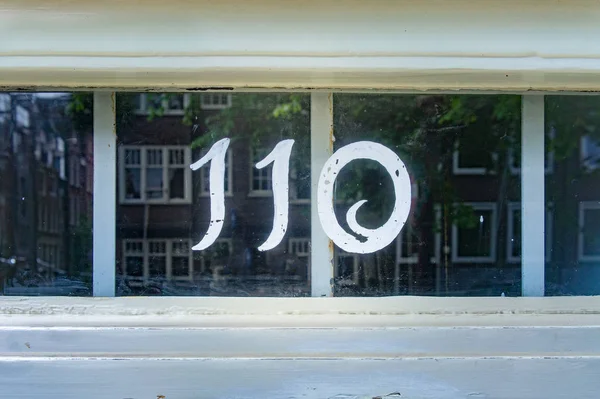 House Number One Hundred Ten 110 — Stock Photo, Image