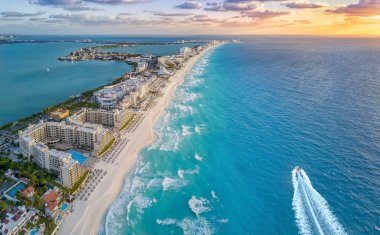 Cancun coast with sun clipart