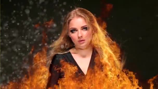 Beautiful Girl Fire Watching Her Hair Develop — Stock Video