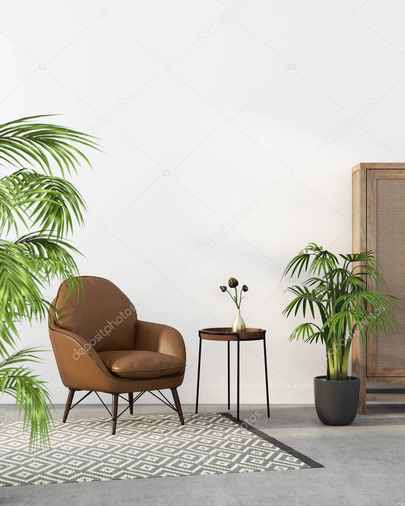 Brown leather armchair and tropical plants