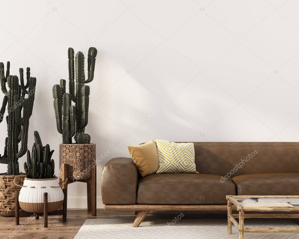 Boho-style interior with leather sofa and cacti