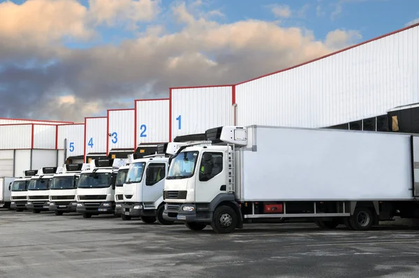 Delivery Trucks Parked Front Hangar Stock Image