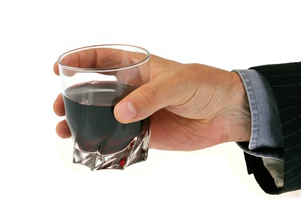 Människans Hand Håller Ett Glas Alkohol Närbild Vit Bakgrund — Stockfoto