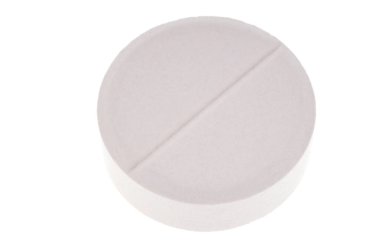 Aspirin hapı beyaz arkaplanda yakın plan