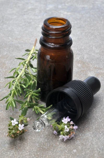 Bottle of thyme essential oil