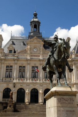 Statue of the Chevalier de Richemont in front of the town hall of Vannes clipart