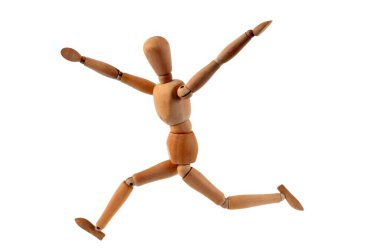 Wooden articulated mannequin running on white background clipart
