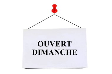 Beyaz arka planda açık pazar günü Fransızca yazılmış bir kart.