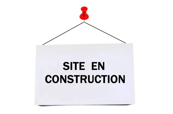 Cartão Fixo Fundo Branco Com Site Construção Escrito Francês Nele — Fotografia de Stock