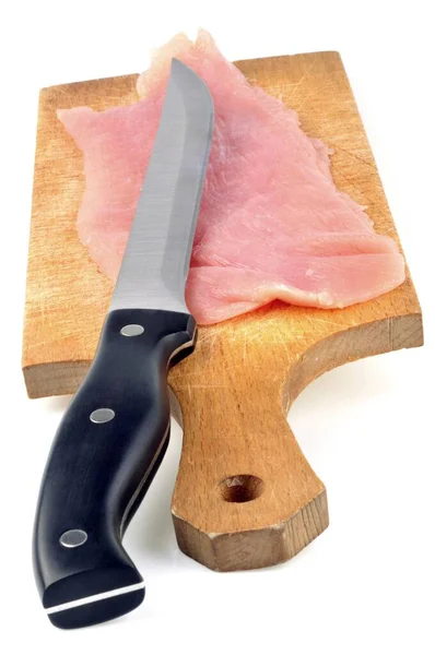 Kalbsschnitzel Auf Einem Schneidebrett Mit Einem Messer Nahaufnahme Auf Weißem — Stockfoto