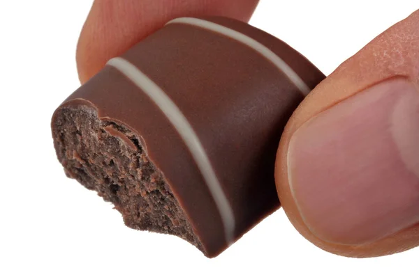 Chocolade Vulling Hand Close Witte Backgroun — Stockfoto