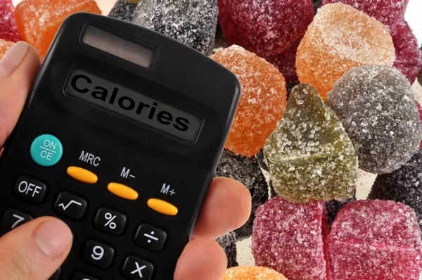 Koncepcja Obliczania Kalorii Słodycze Kalkulatorem — Zdjęcie stockowe