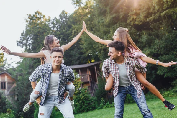 Happy Couples Park Men Carrying Women Shoulders — Stock Photo, Image