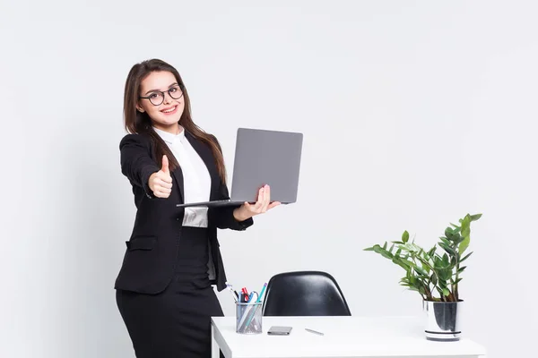 Young businesswoman very busy and office isolated on white background