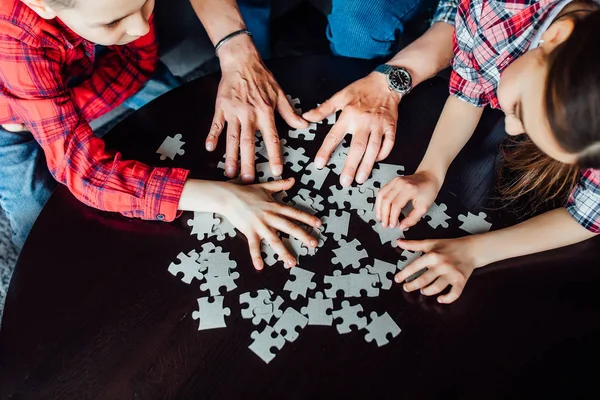 Cropped View Grandfather Children Assembling Puzzle — Stock Photo, Image