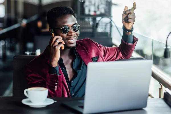 Young Businessman Sitting Cafe Laptop Phone His Hand Table Coffee — Stock Photo, Image